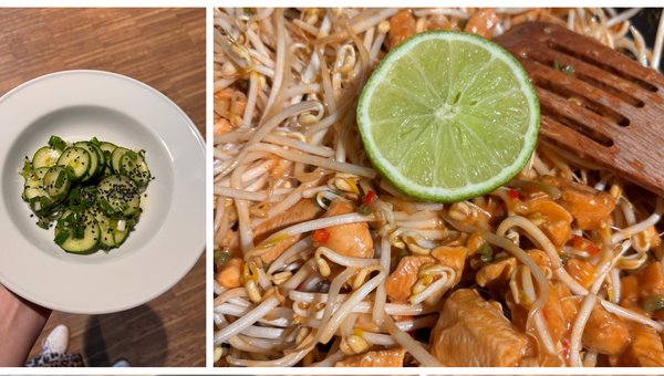 Ein Teller voll mit Gurkensalat und ein Teller voll mit Glasnudeln mit Poulet, Sprossen und einer Scheibe Limette